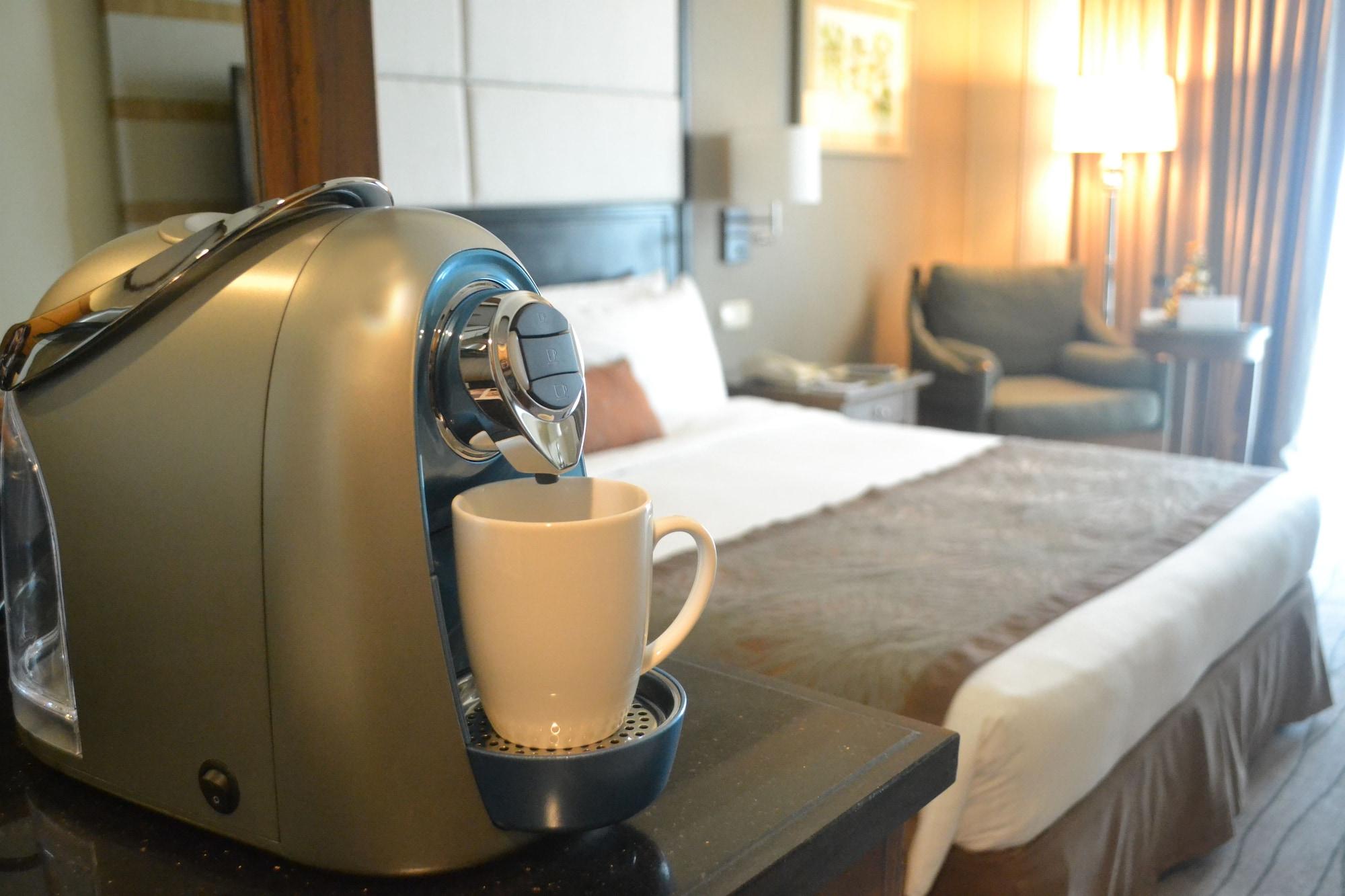 Marco Polo Davao Hotel Exterior foto A Nespresso machine in a hotel room